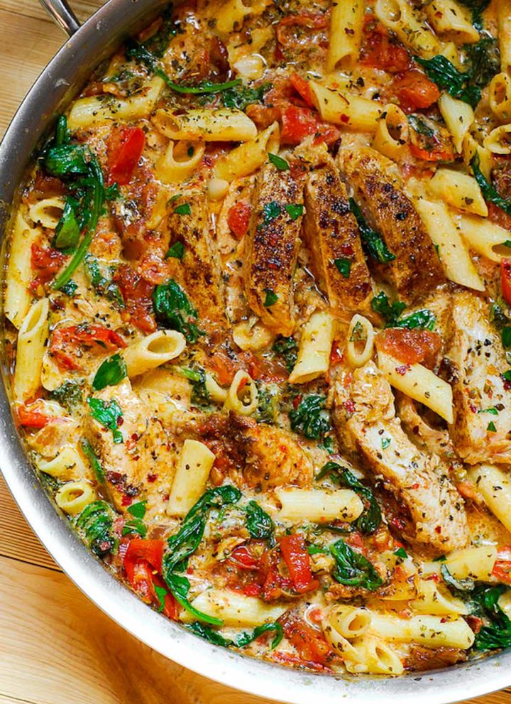 creamy chicken pasta in a skillet