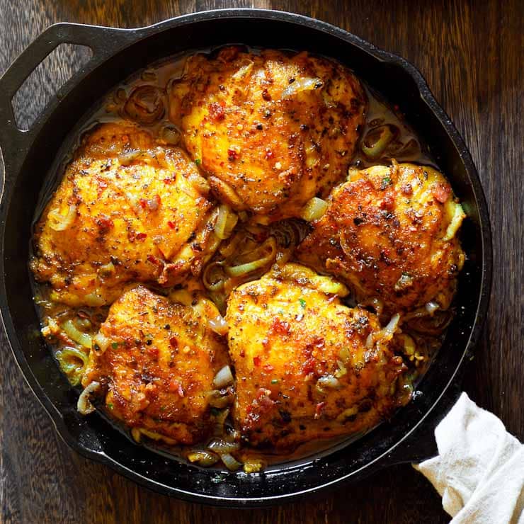 Chicken with Bacon baked in cast iron pan