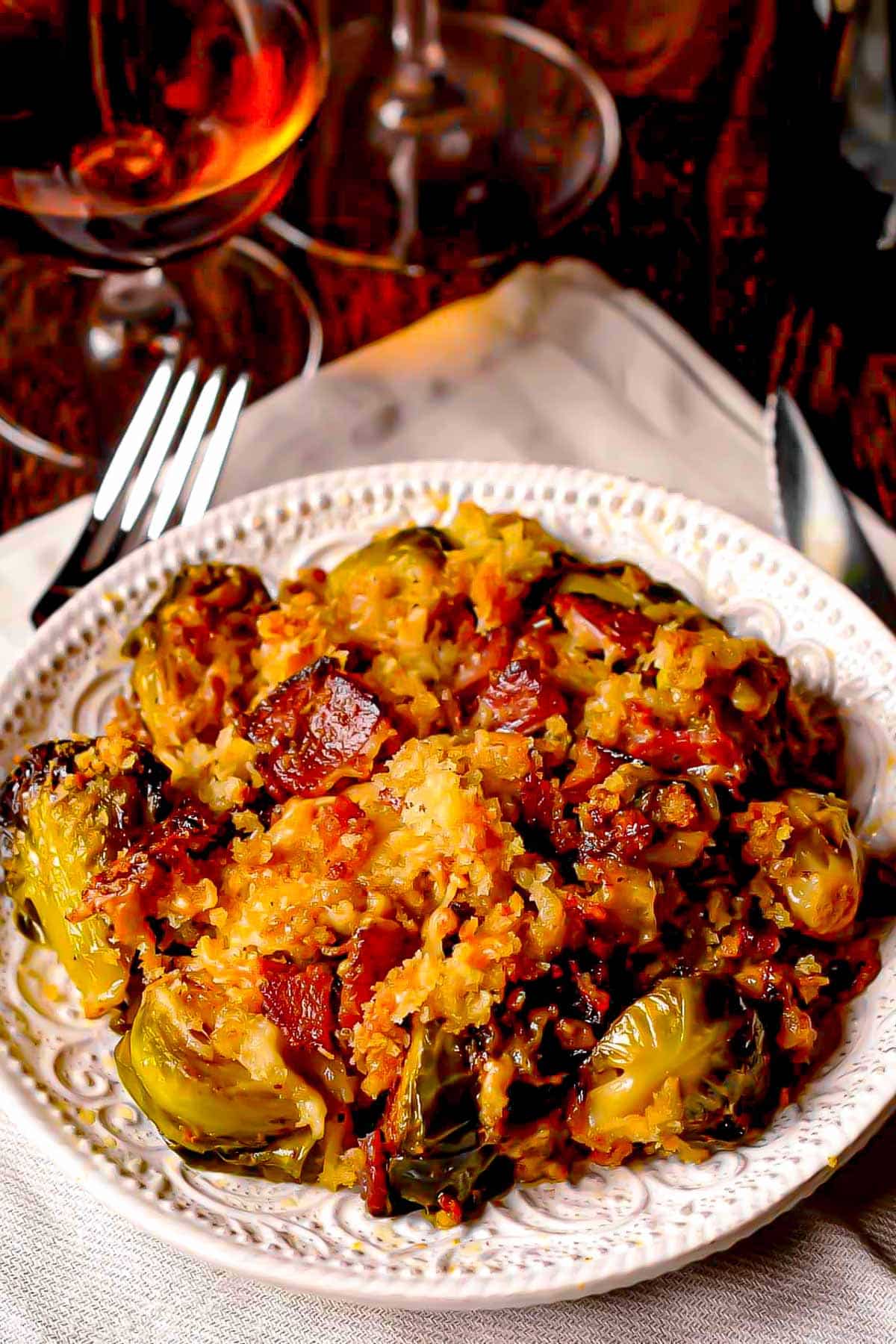 brussels sprouts and bacon gratin with gruyere crust on a plate