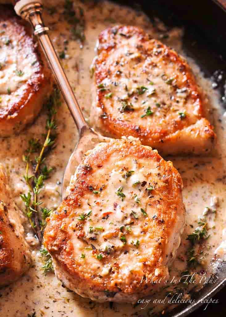 Creamy Low Carb Pork Chops (Gluten Free) in a cast iron pan