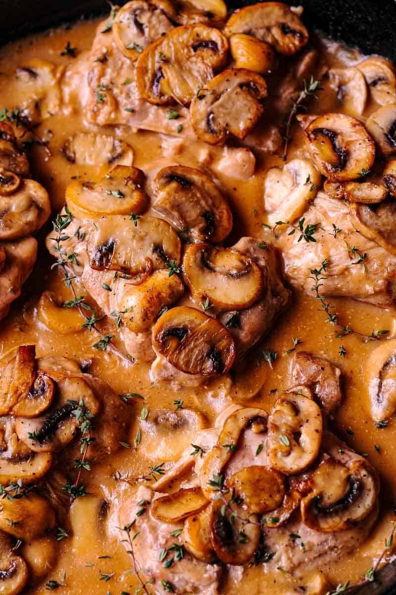 Skillet Chicken Thighs in Creamy Mushroom Pan Sauce chicken thighs with creamy mushroom sauce