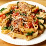 Chicken Pasta with Bacon and Spinach in Creamy Tomato Sauce