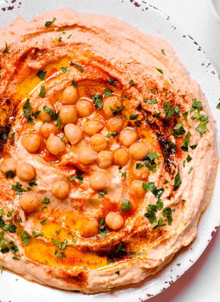 Easy Hummus with Chickpeas on a white plate