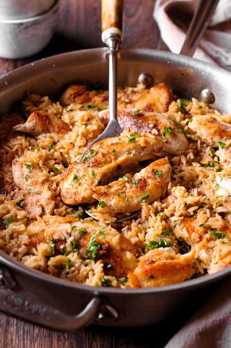 Chicken with Garlic Parmesan Rice is the perfect dish for easy weeknight dinners. This quick chicken and rice recipe is not only tasty but it uses ingredients you likely have on hand!