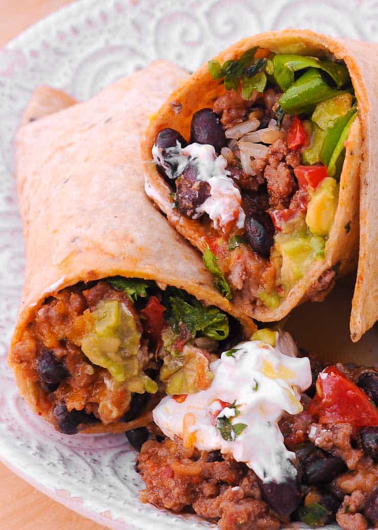 Beef Burritos with sour cream and black beans
