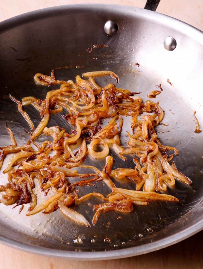 Caramelized onions in stainless steel pan