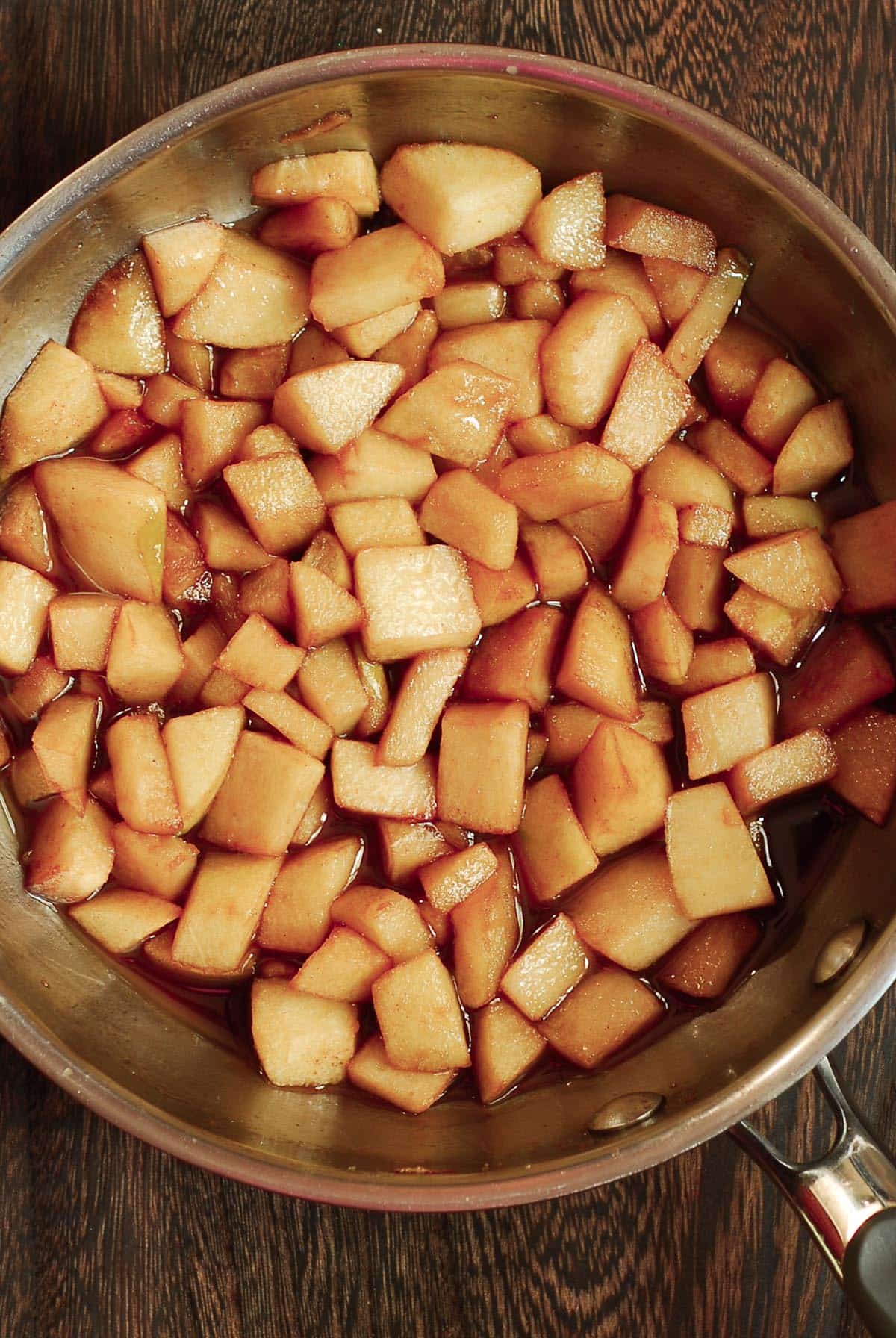 Apples cooked in a small pan