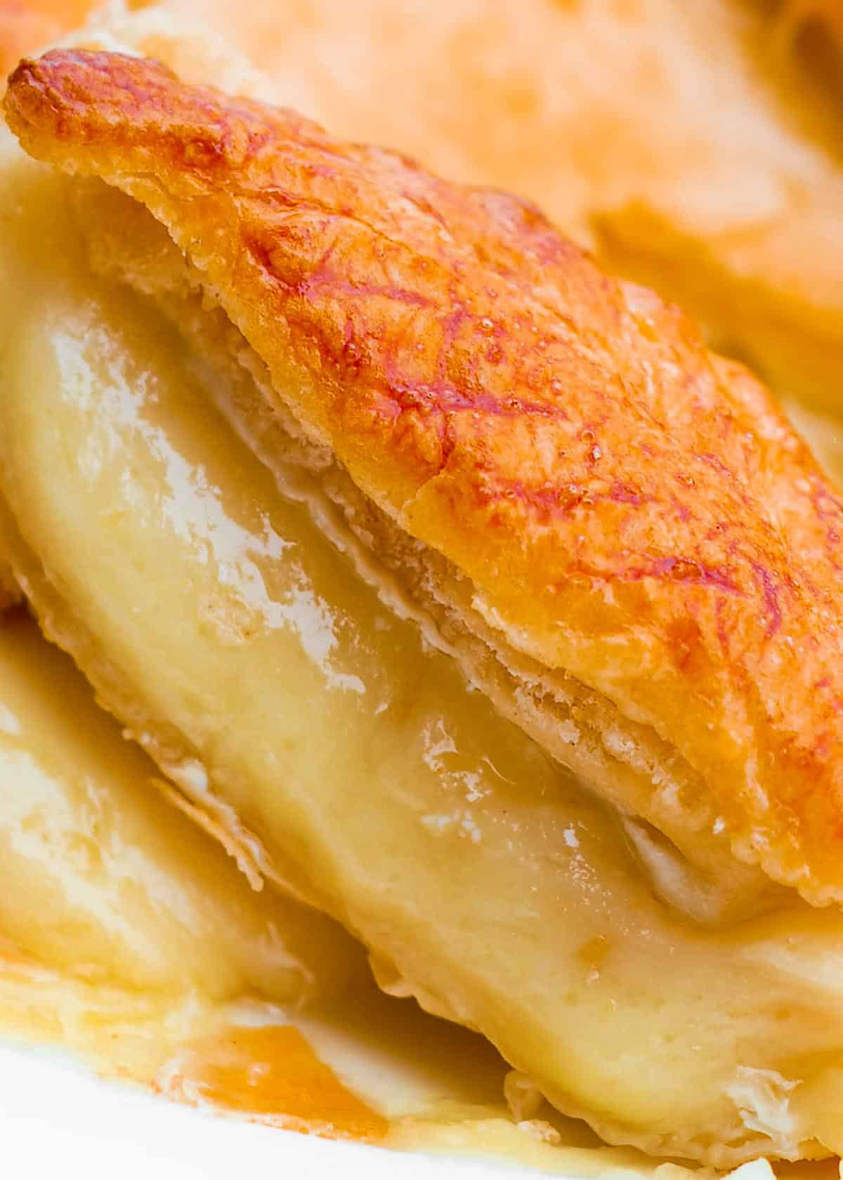 Brie bread slice with melted cheese