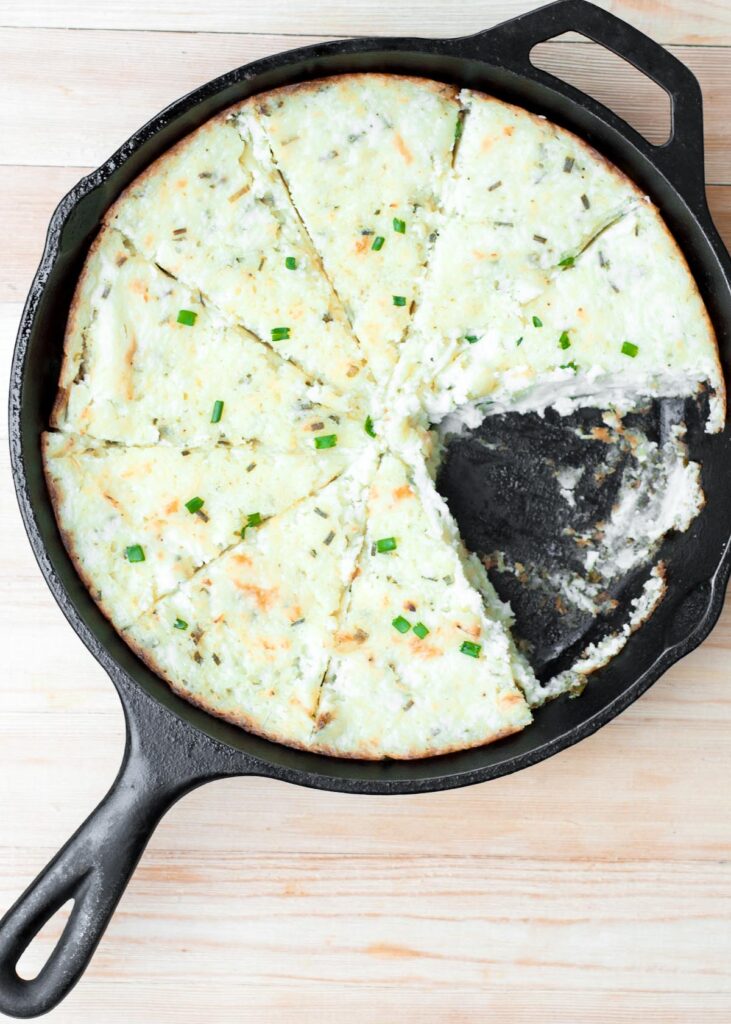 Buttery Mashed Potato Pie with Herb and Garlic Cream Cheese in a pan