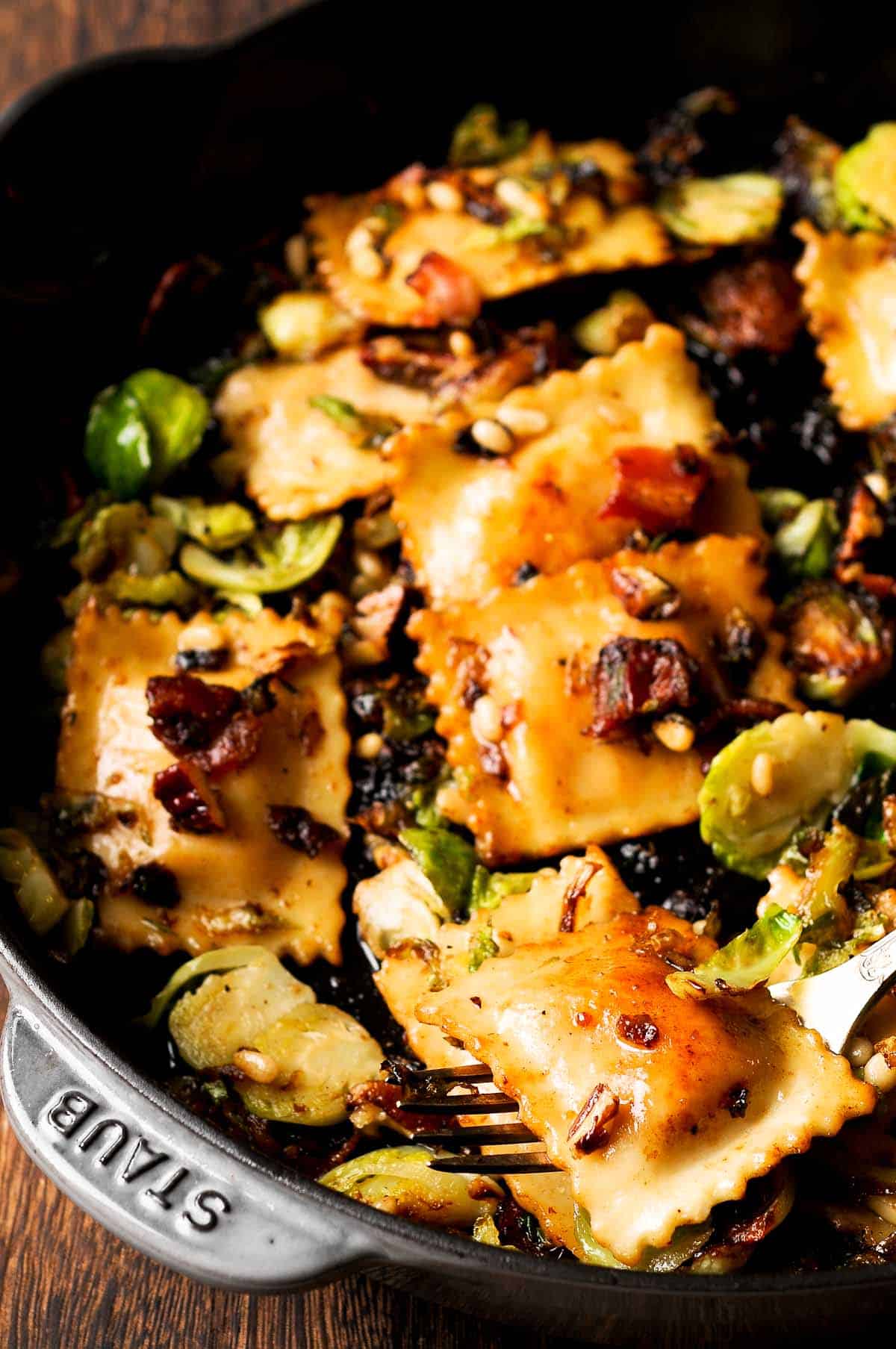 Brussels Sprouts and Ravioli with Maple Pecans and Pine Nuts in large skillet close up