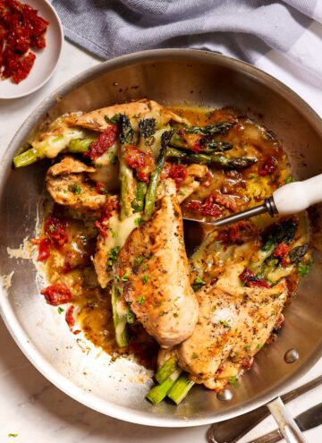 Chicken with Asparagus and Cheese on a pan