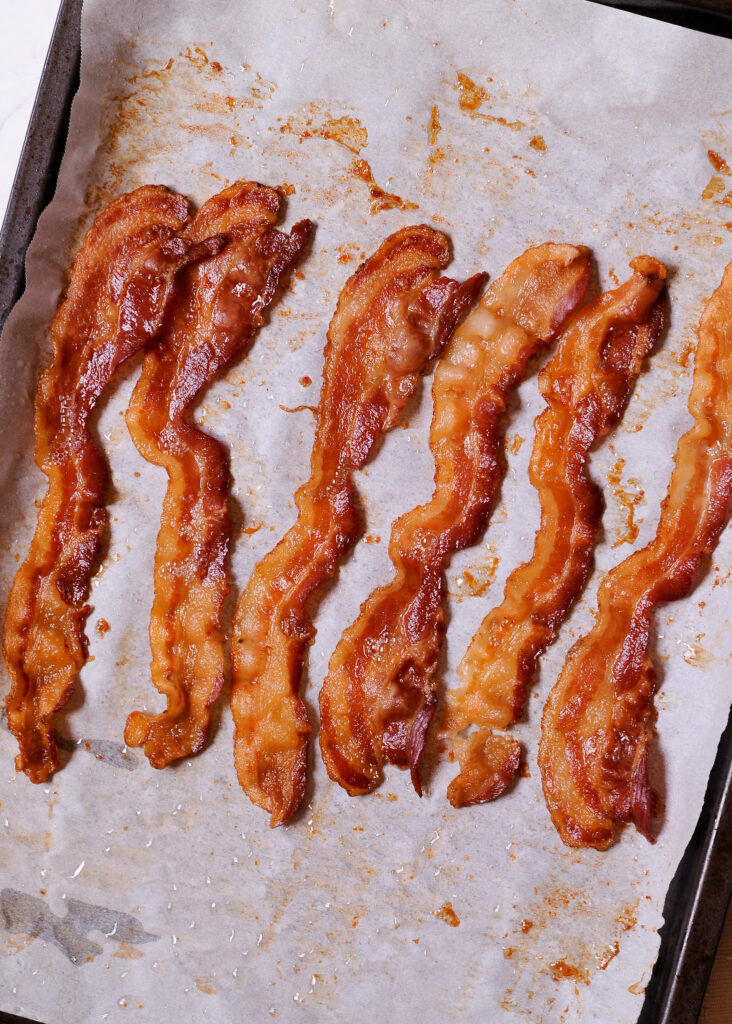How to cook bacon in the oven on a cooking sheet
