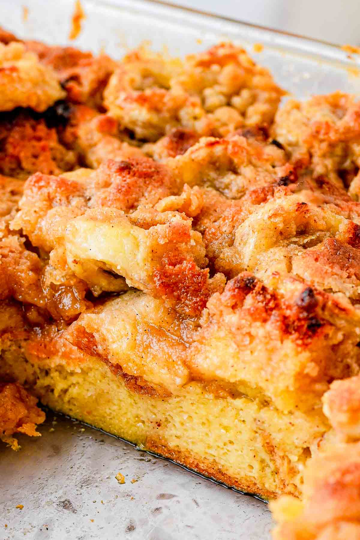 Banana French Toast Casserole inside the casserole dish showing layers of french toast and bananas