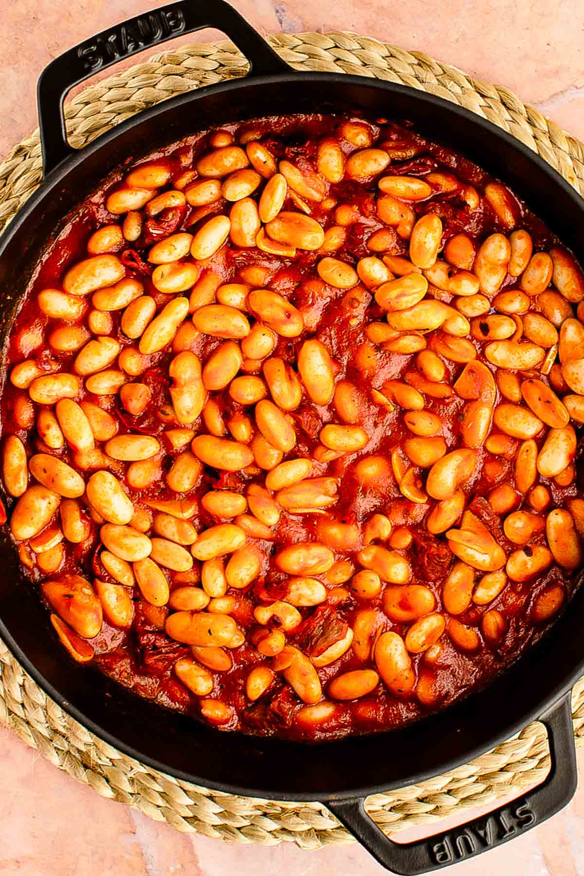 vegetable broth poured over the butter beans