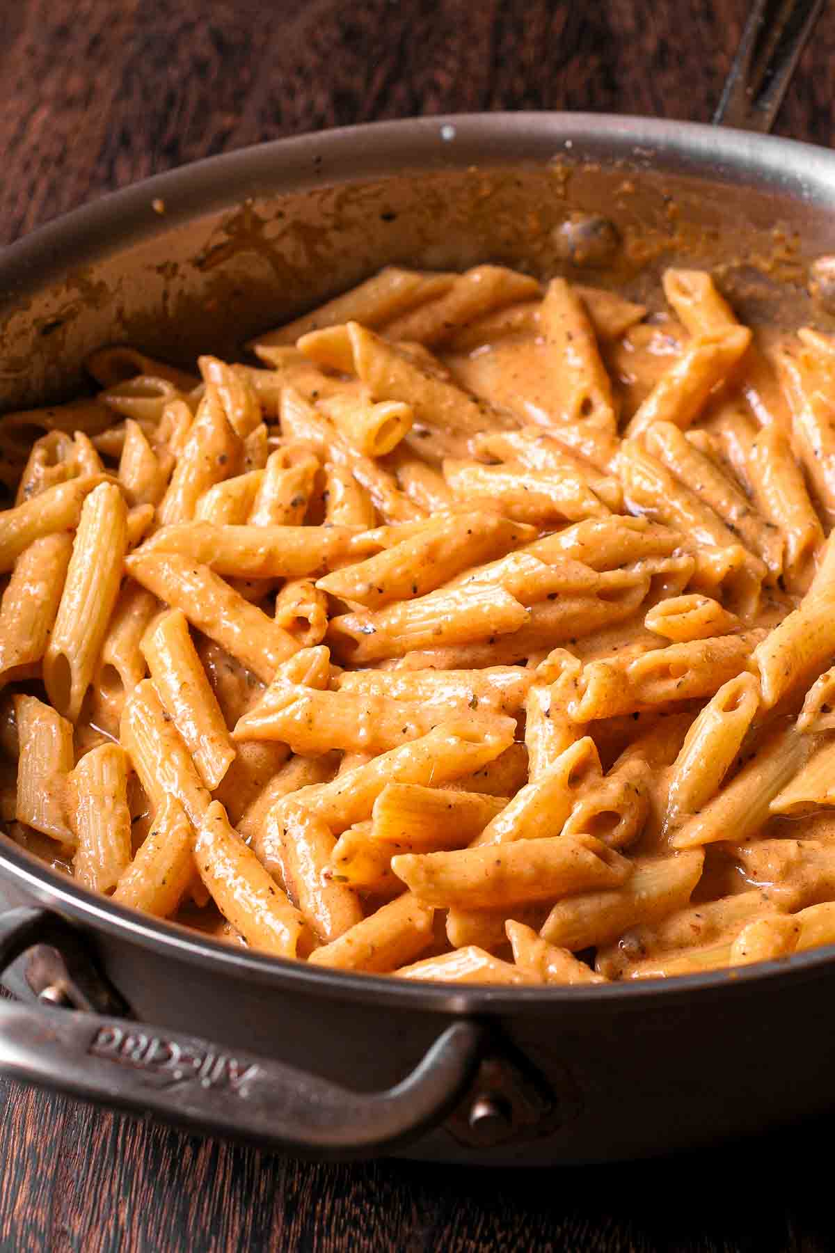 Creamy Cajun Chicken Pasta with Smoked Sausage Cooked pasta with cajun sauce