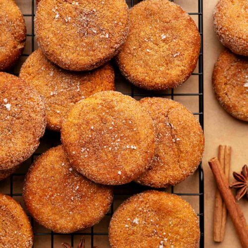 pumpkin snickerdoodle cookies on the baking sheet