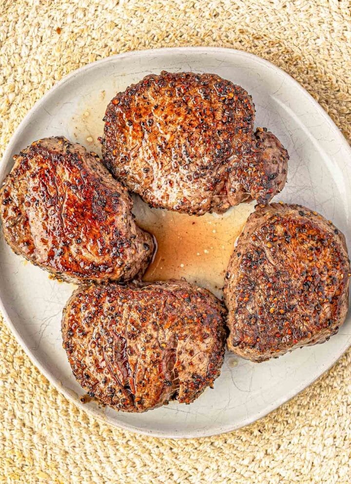 seared steaks on a plate