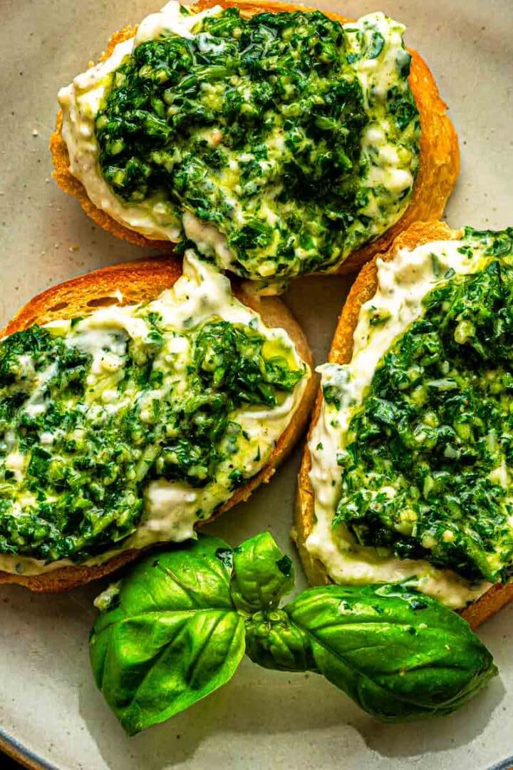 Whipped ricotta with pesto that doesn't go watery. Drained ricotta whipped with cream cheese for a thick, fluffy dip in 20 minutes. Serve as an appetizer or pasta sauce.