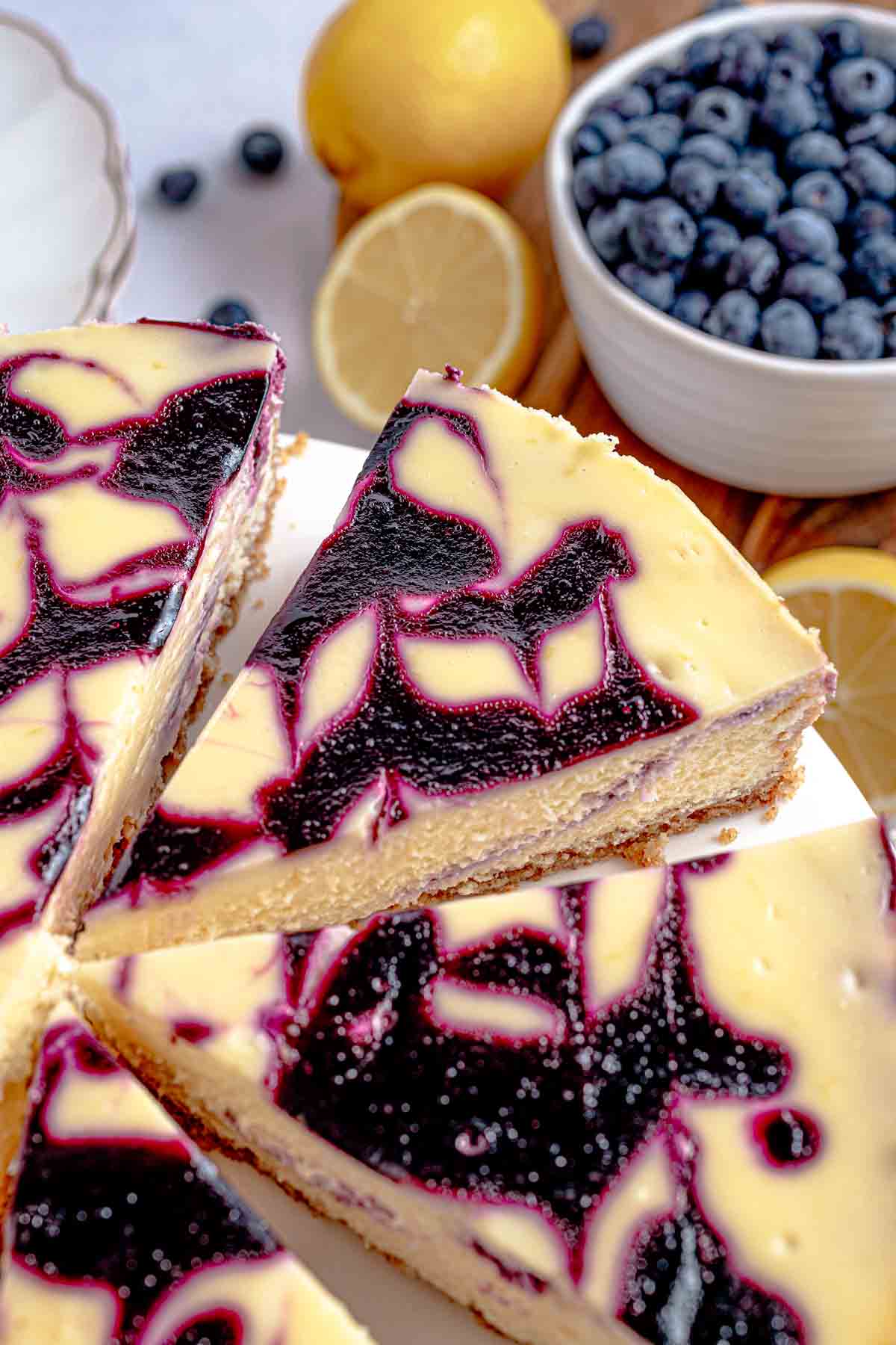 lemon blueberry cheesecake with fresh bluebrry swirl