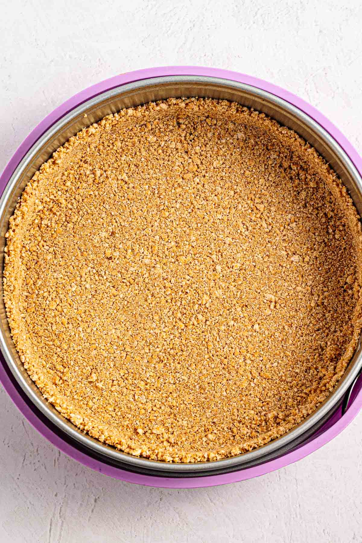 graham cracker crumbs and butter pressed firmly into a pan