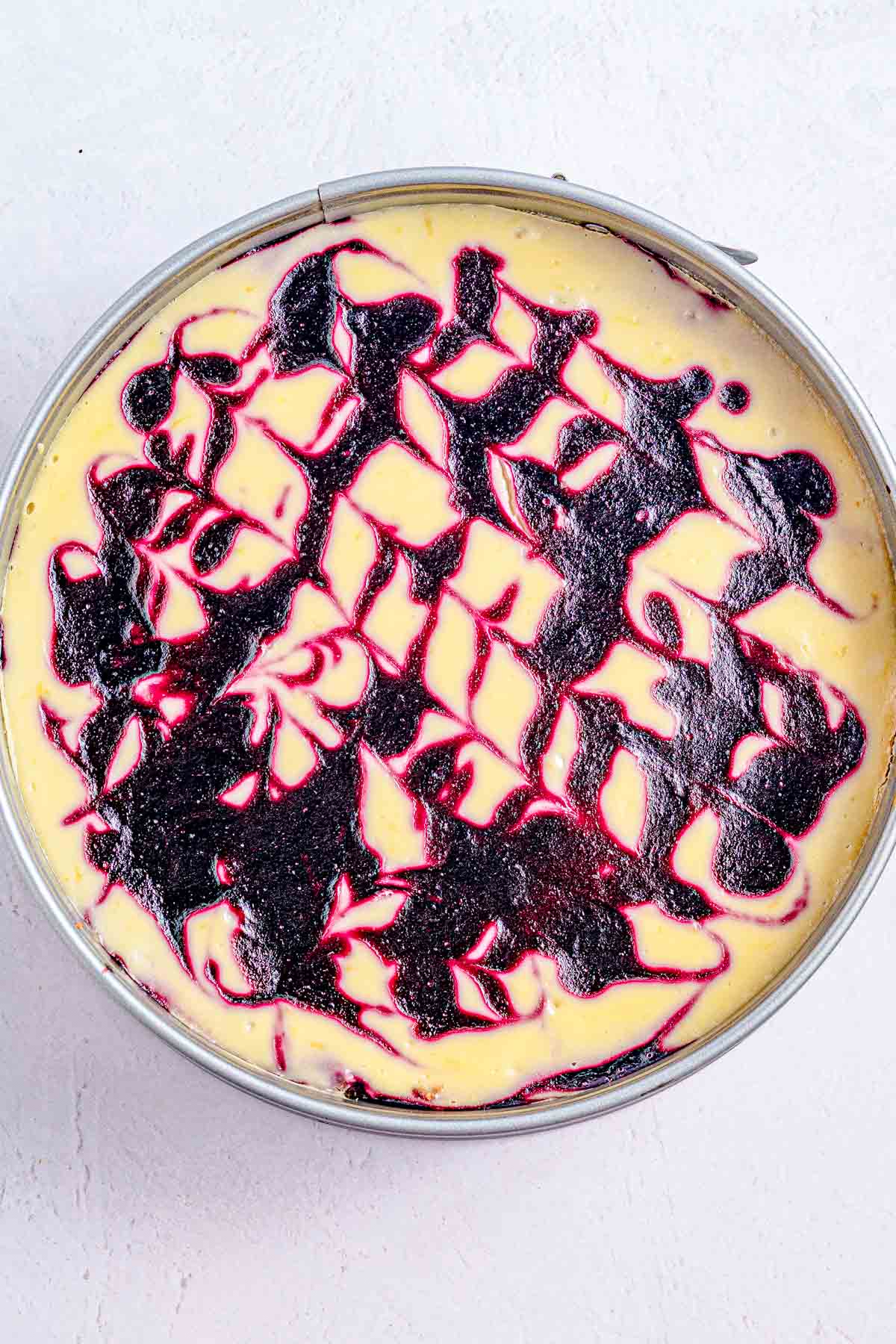 Lemon Blueberry Cheesecake with Blueberry Swirl after being baked in water bath