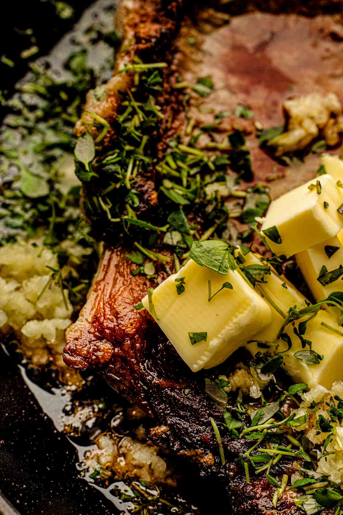 butter basting the steak