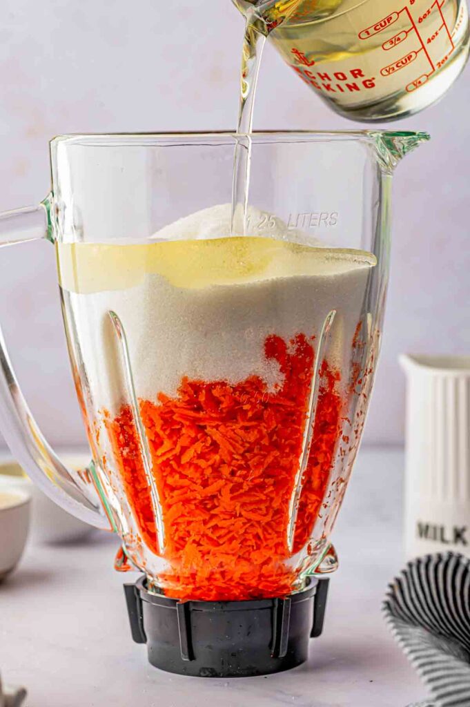 grated carrots, granulated sugar and egg added to the food processor