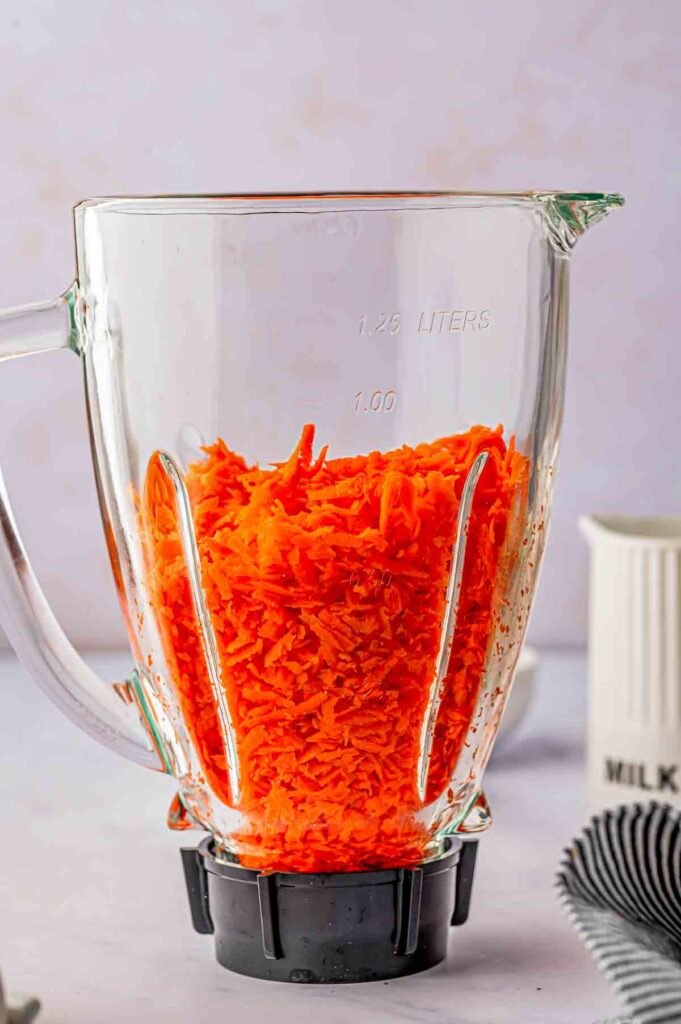 grated carrots added to the food processor