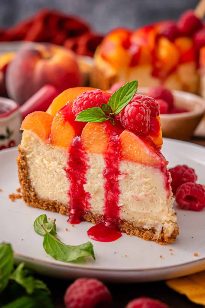 Raspberry Peach Cheesecake with Homemade Raspberry Sauce