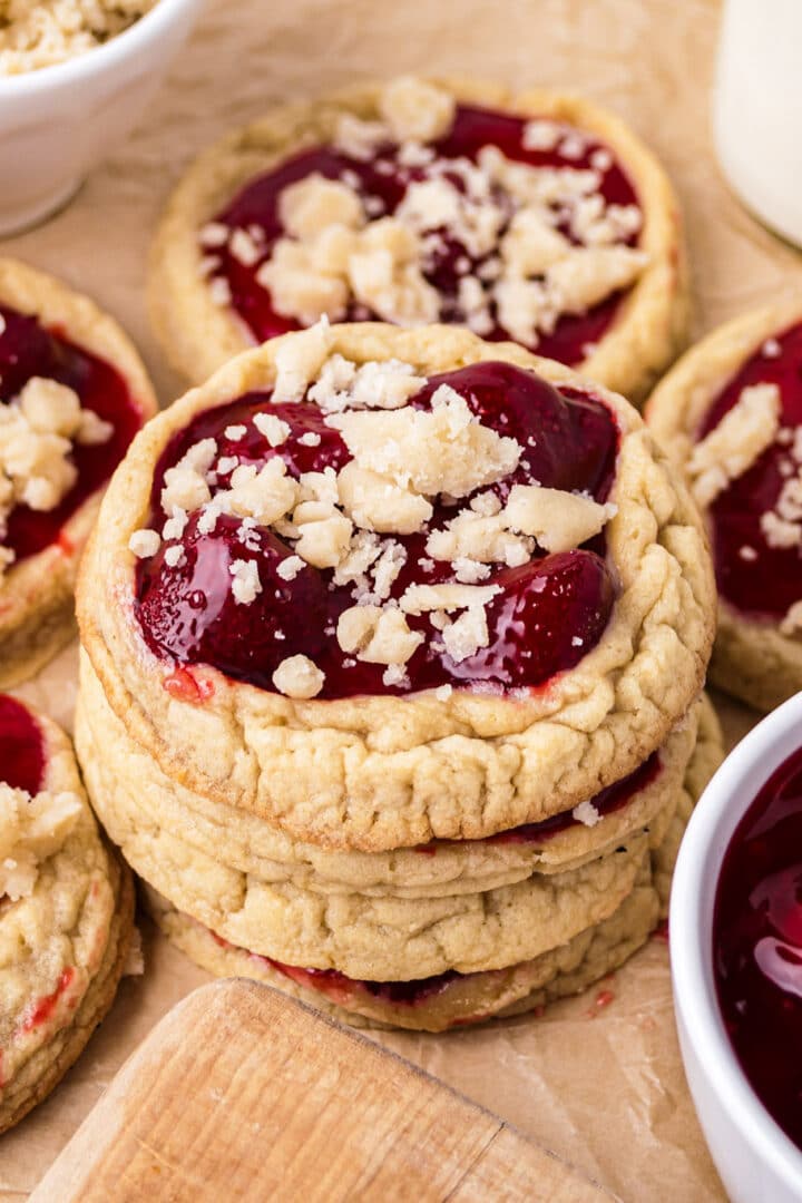 Strawberry pie filling cookies with streusel topping on a plate