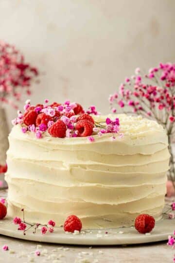 white chocolate frosting on a cake