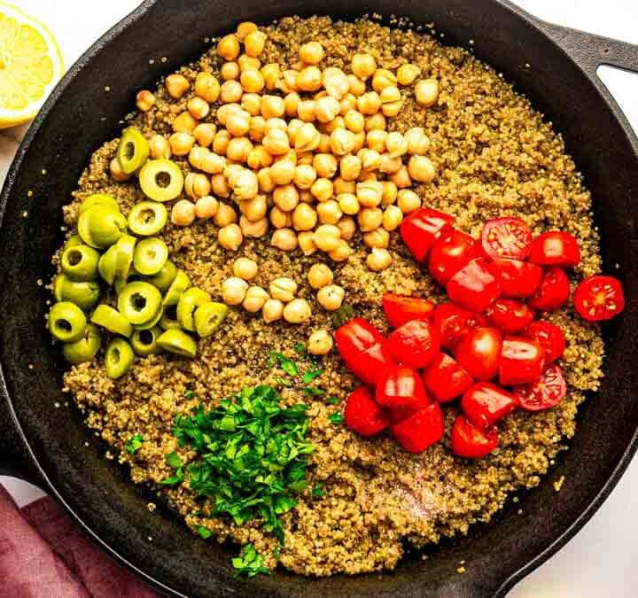 Cooked quinoa in a skillet