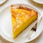 Close up of a slice of Peach Cake on a plate