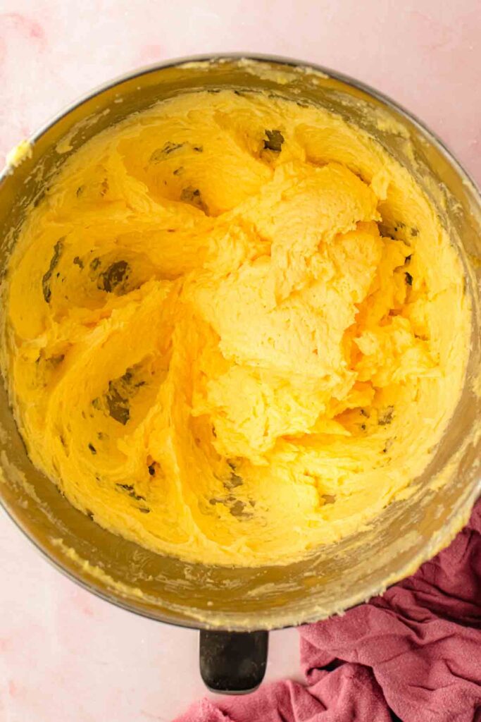 Curdled cherry bundt cake batter after adding cold eggs, before flour and sour cream smooth it out
