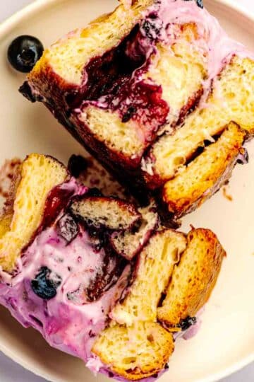 blueberry cinnamon rolls with blueberry jam swirl, cinnamon sugar layer, and lemon glaze.