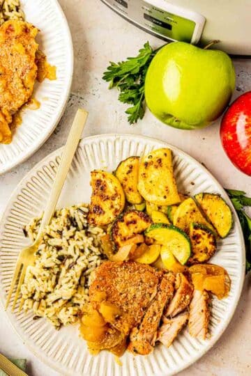 Crockpot Apple Pork Chops with Honeycrisp and Granny Smith on a plate
