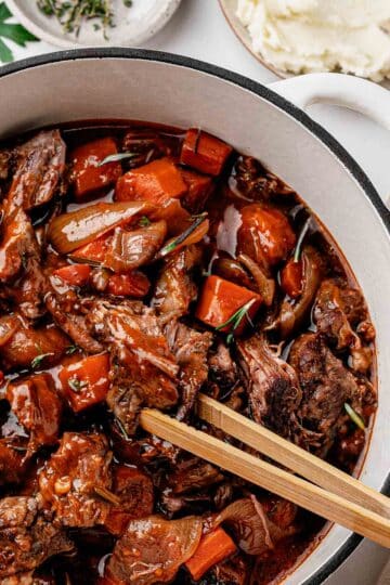 Dutch Oven Pot Roast with gravy, red wine and carrots Close Up