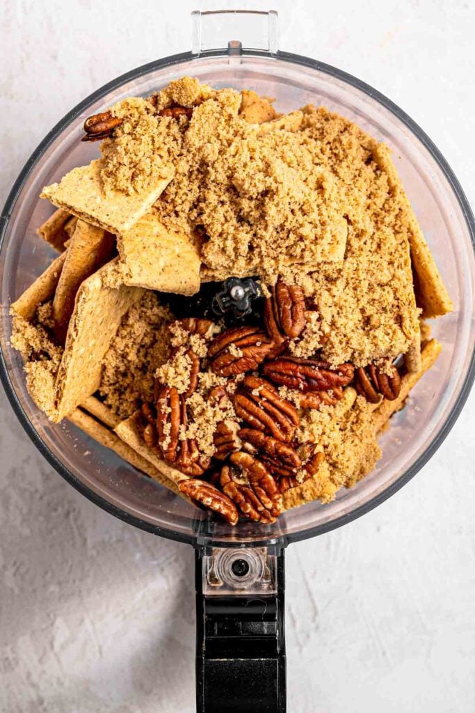 Graham crackers, pecans and brown sugar ground into fine crumbs in a food processor