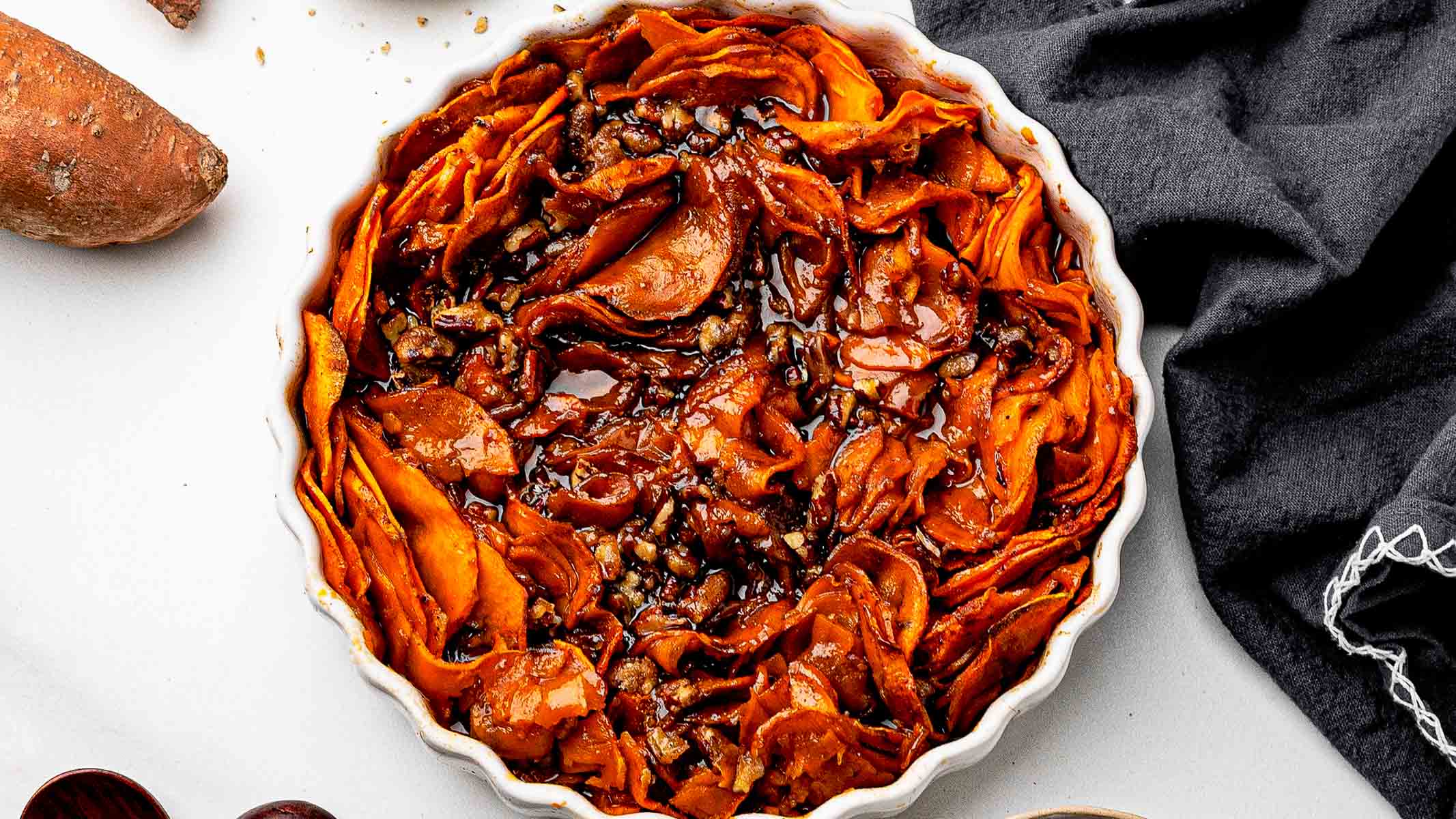 Sliced Sweet Potato Casserole with Pecans and Maple Syrup