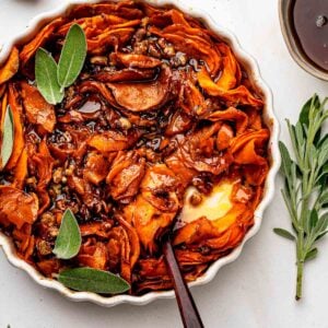 Sliced Sweet Potato Casserole with pecans and maple syrup