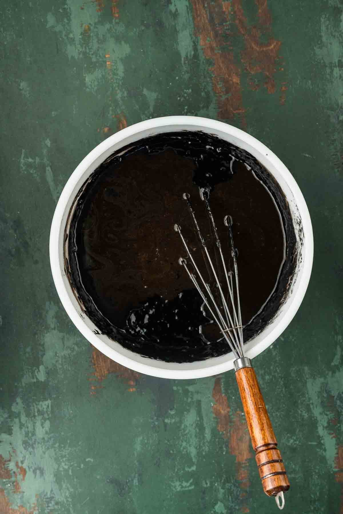 Sugars, buttermilk, oil, eggs, vanilla, and vinegar whisked together in a large bowl