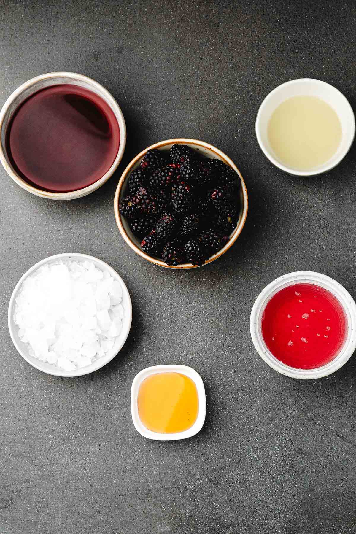 Ingredients: Fresh blackberries, purple grape juice, lemon juice, honey, and sparkling water for blackberry witches brew